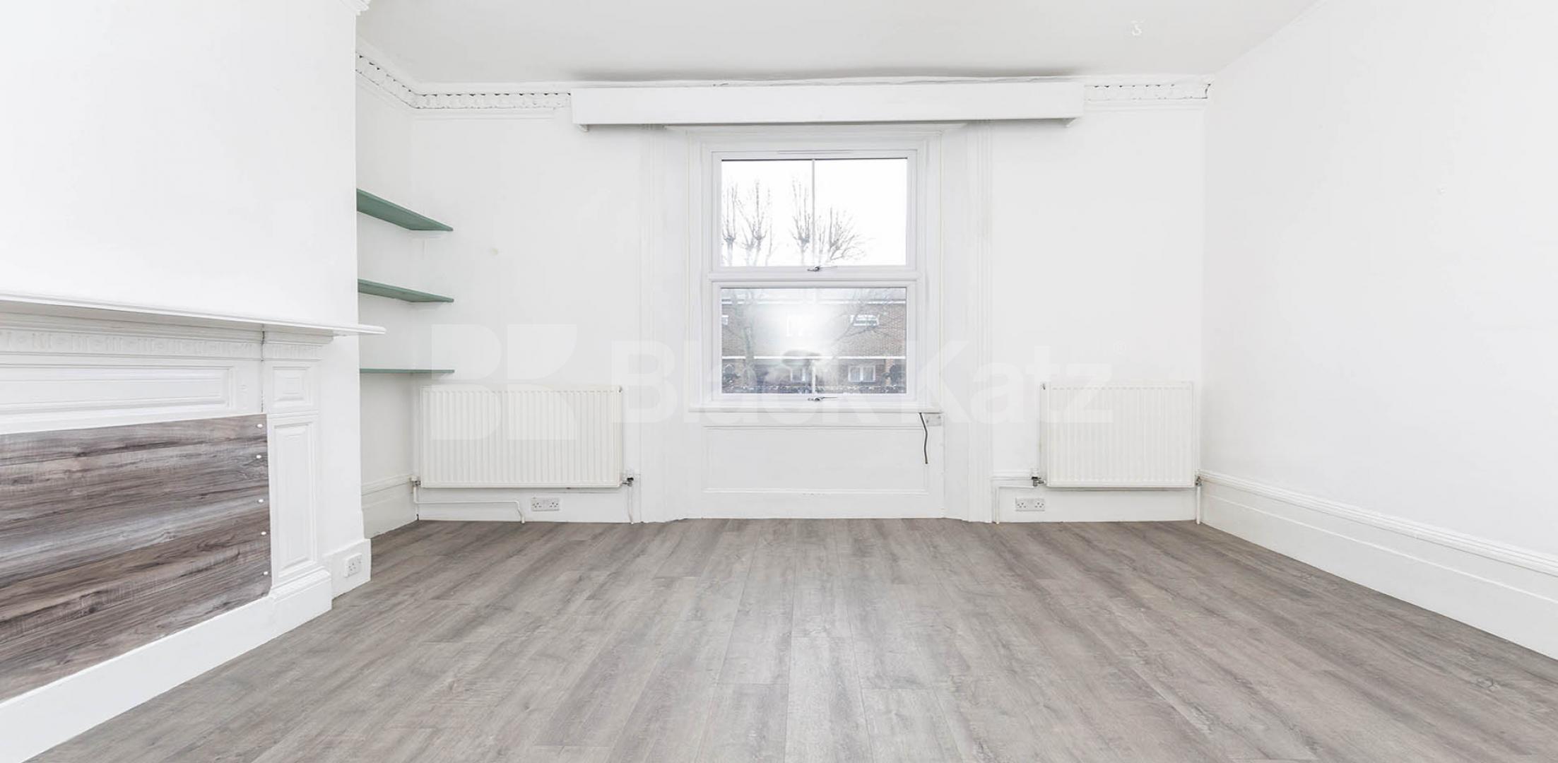 Split over two floors a large 3 bedroom apartment with kitchen diner Hungerford Road, Hillmarton Conservation Area 